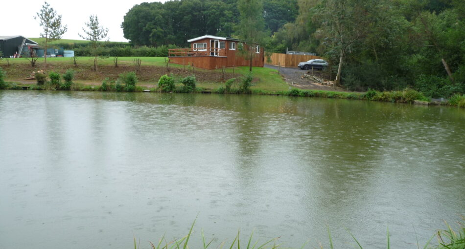 Looking across to the holiday lodge at Furnace Mill Fishery in Worcestershire