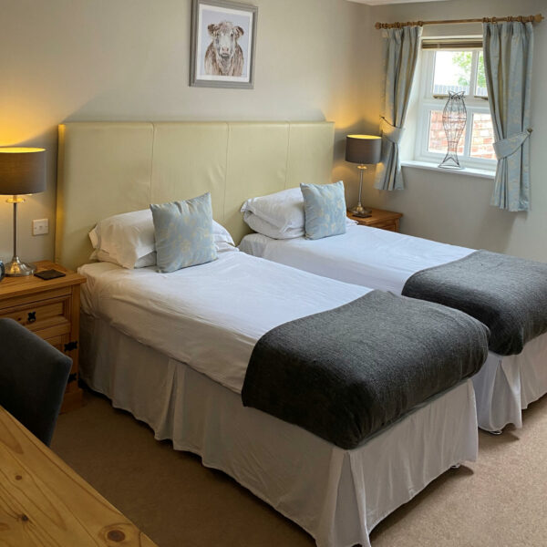 Twin bedded room at New Farm Fishery in Cheshire