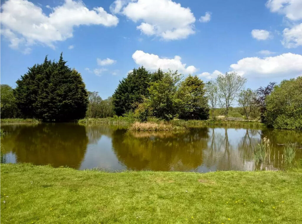 Two bedroom property with land and lake in Wales