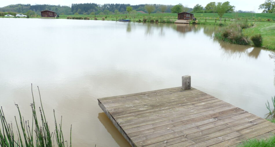 Crabtrees Pool and Lodges at Countryside Cabins fishery in Herefordshire