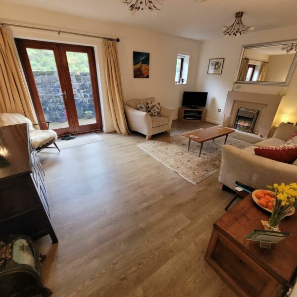 Three bedroom mews property for sale with own fishing lake in Todmorden