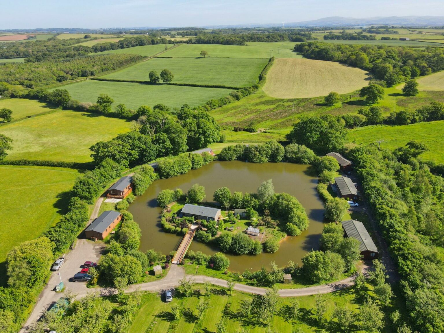 Park home set in orchards with fishing lake for sale Fisheries.co.uk