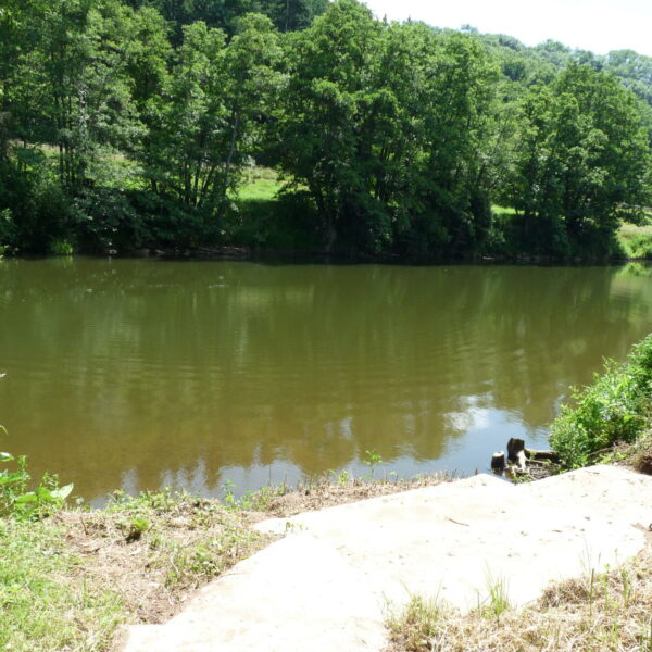 The Fish House Wall at Ingestone Fishery at Foy in Herefordshire