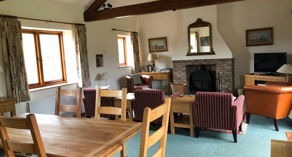 The lounge in the five person cottage at Ingestone Fishery at Foy n Herefordshire