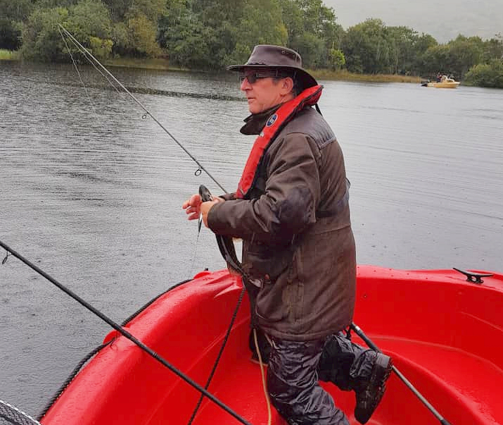 Fishing from a boat on Loch Awe at Portsonachan Hotel