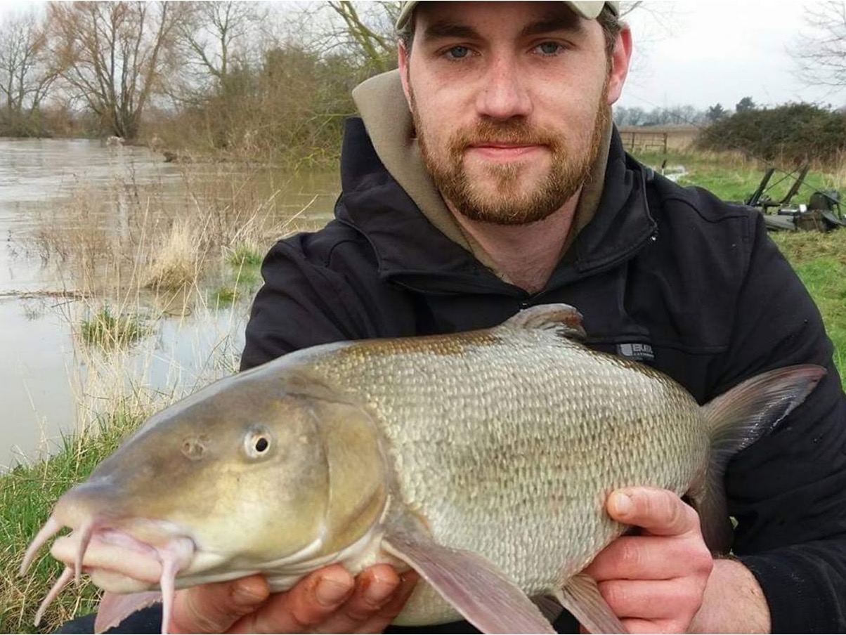 A bristling barbel caught from a flooded Nene backwater