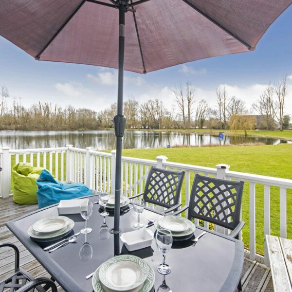 Deck area at Tortola Lodge at Cotswold Water Park