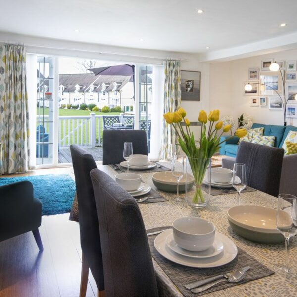 Open plan living/dining area at Tortola Lodge at Cotswold Water Park