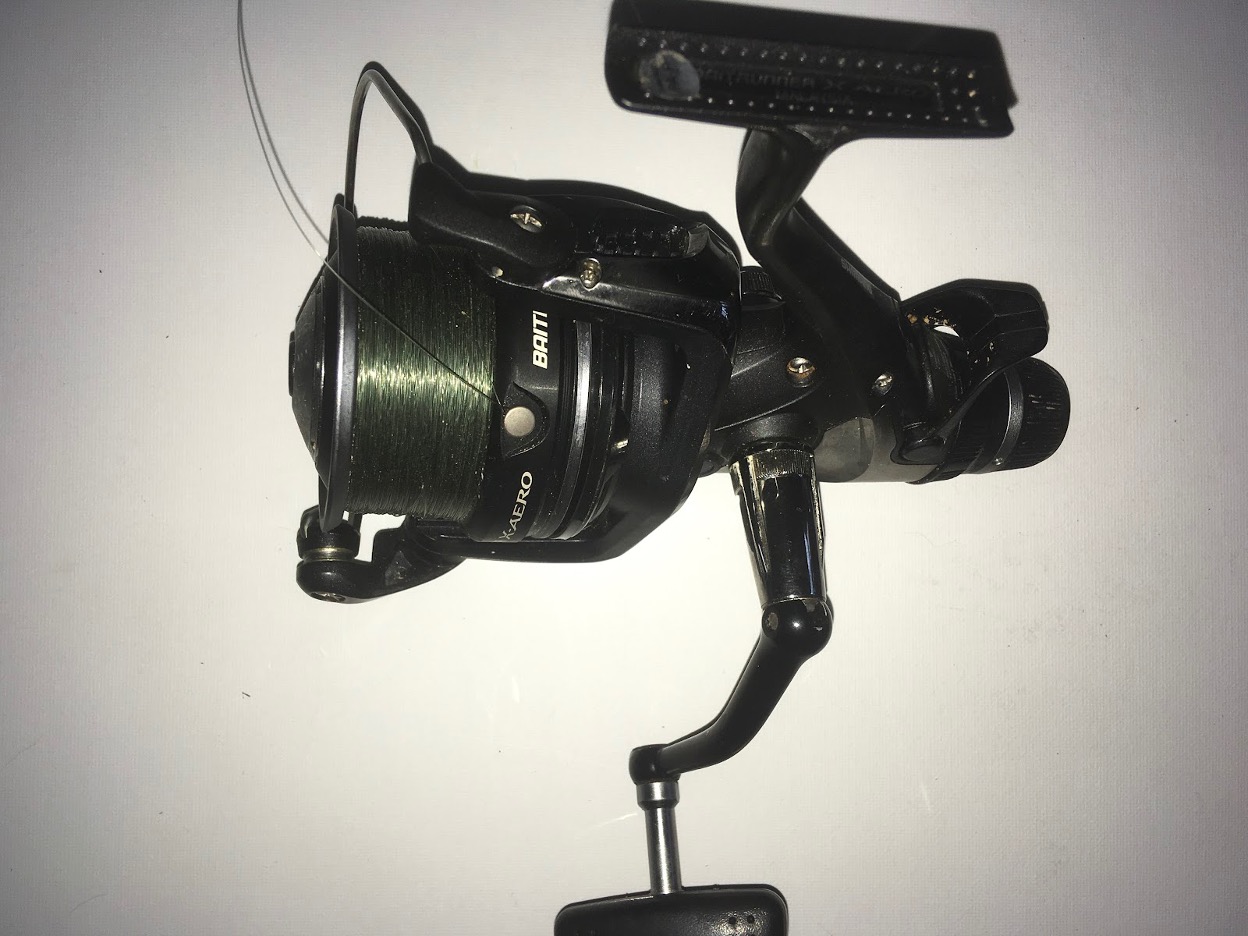 The Daddy of them all. A genuine Baitrunner by Shimano. This reel has no drag control on the front of the spool, both drag systems are controlled by a stacked pair of control knobs at the rear of the reel body. One knob-ring provides the drag setting for the spool during ‘normal use’ and the other provides the variation to the drag applied to the spool when it is in free-spool mode, a.k.a. ‘Baitrunner’ mode. The lever on the rear engages and disengages the ‘baitrunner’ option.