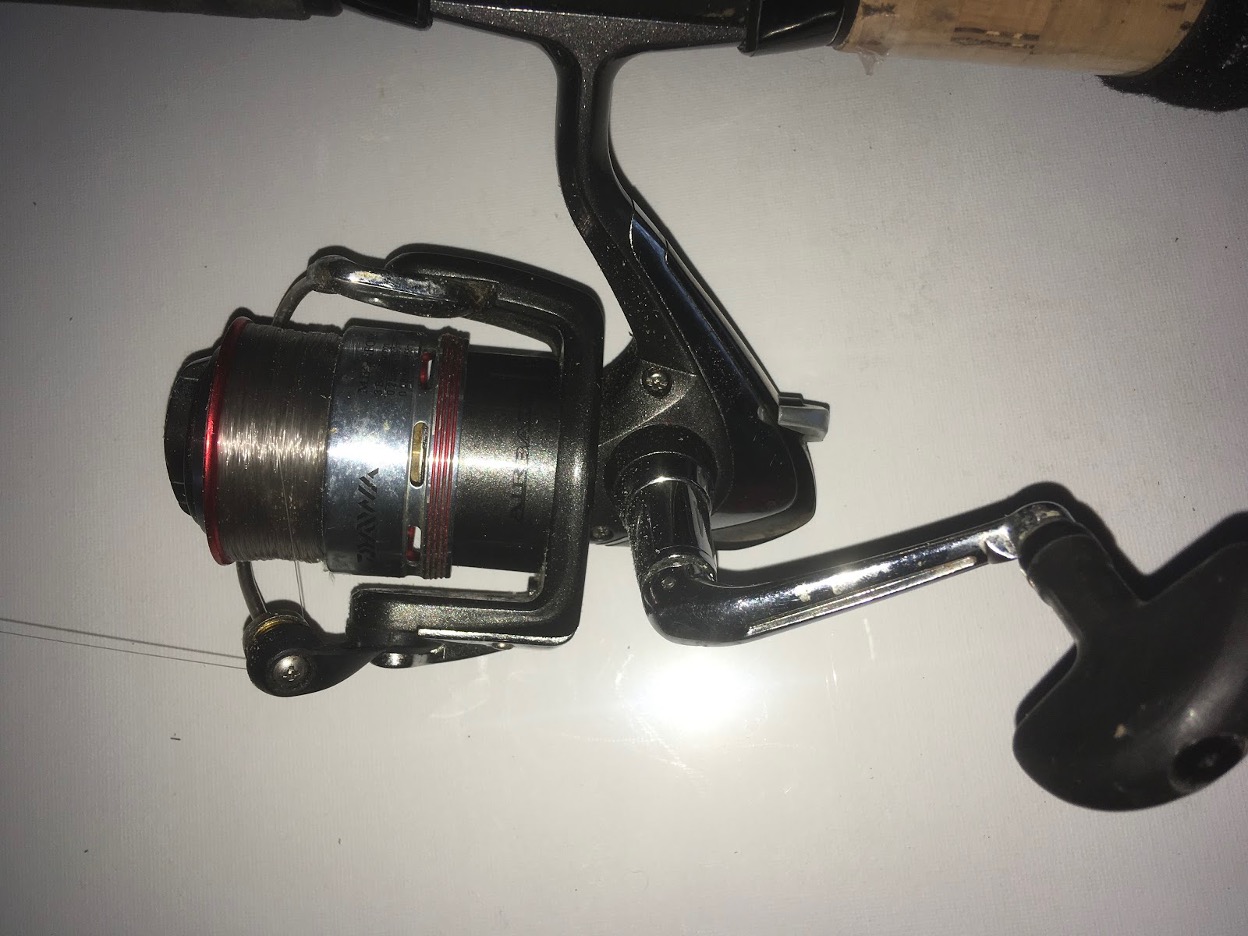 A front drag spinning reel made by Daiwa. The main body of a front-drag reel is lighter, smaller, more compact, and has cleaner lines than an equivalent rear drag reel. The only bit sticking out on the rear of the body on this one is the anti-reverse lever. The drag control knob is located on the front of the spool and it doubles as the screw-on locking disc for the spool. Increasingly this is becoming the most popular style of reel. Is this because we end-users like them, or could it be because the manufacturers find increased profit in making them? We will never know. I personally find adjusting a front drag reel mid-fight to be more challenging than adjusting a rear drag knob. Clearly, nobody ever asked my opinion on where to put the knob and what design of reel to make.