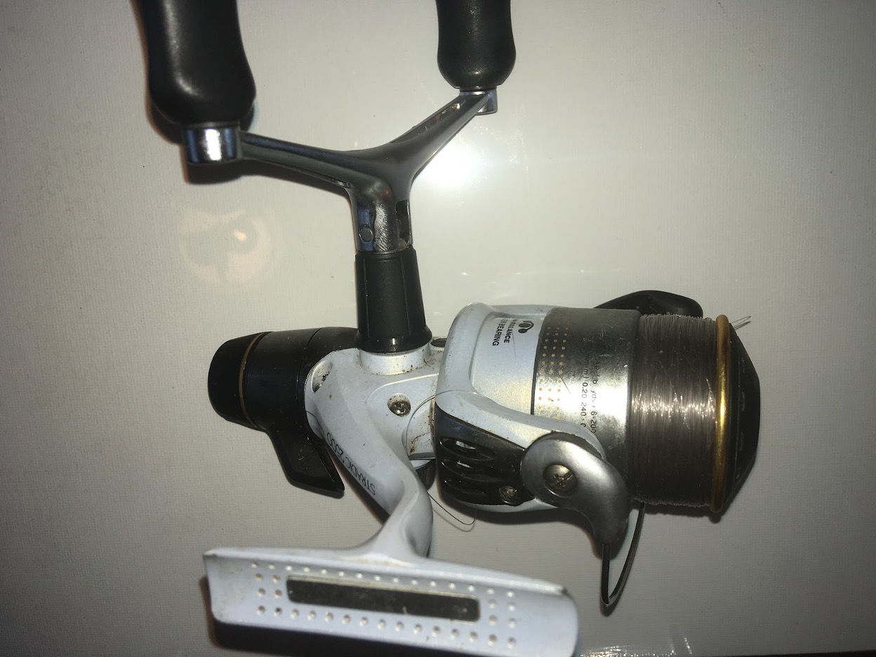 A rear drag reel by Shimano. The drag control knob can clearly be seen sticking out the rear end of the body, like some angling tribute to the Kardashians. This particular reel, a Stradic GTM RA is fitted with a Shimano peculiarity known as ‘Fightin’ Drag’. Similar to a baitrunner this reel can be adjusted into freespool mode by the lever just above the drag knob. In mid position the reel acts as a standard rear drag reel. Push the lever to the left and the drag applied to the spool reduces incrementally until at the extreme position it becomes a free spool. Pushing the lever back to the right increases the drag incrementally until the extreme position is reached and the spool becomes fully locked. It is the reel equivalent of the love child between a standard rear drag reel and a baitrunner. I find it works brilliantly when you are playing a fish, especially bigger fish, and it gets two thumbs-up from me!