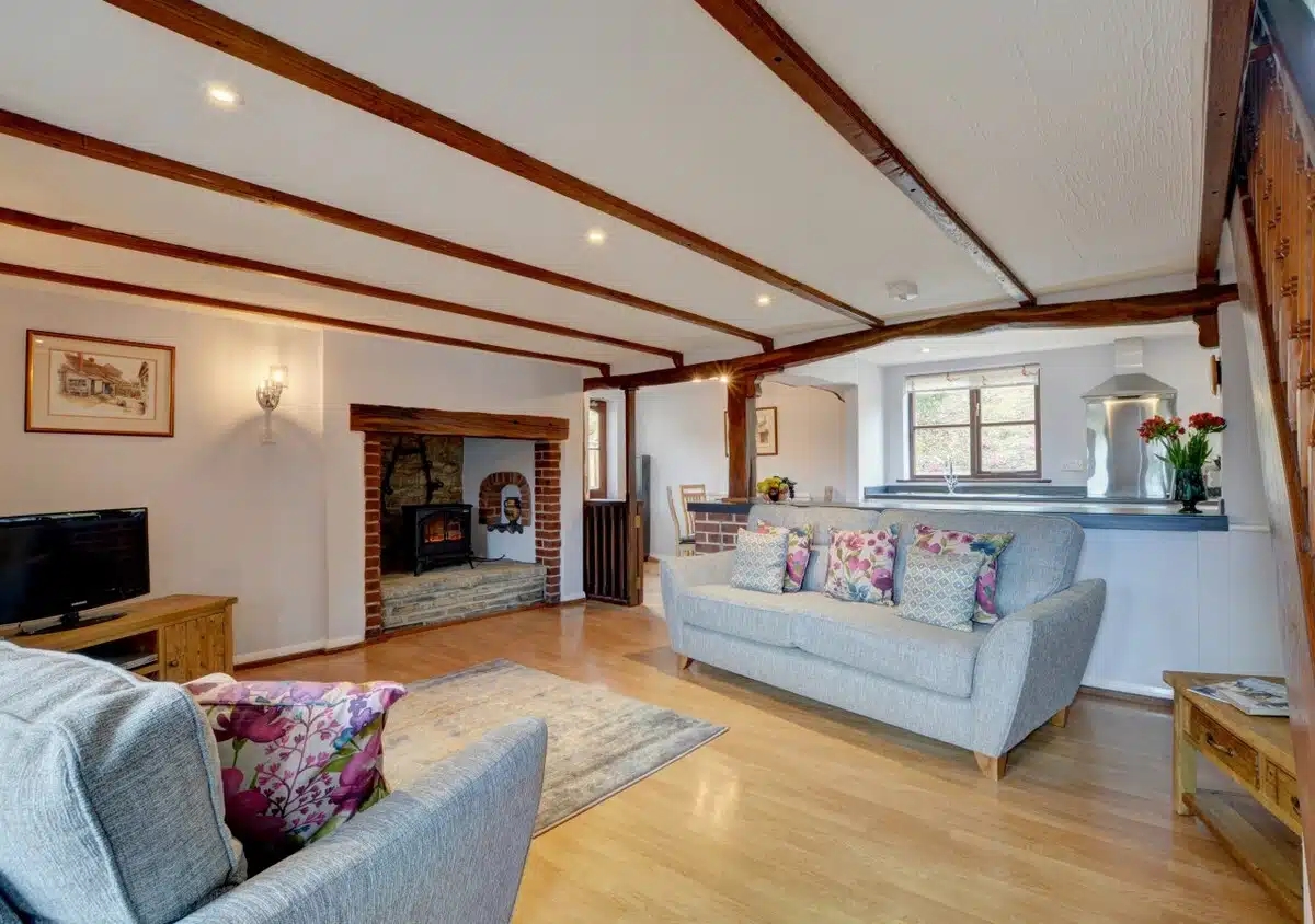 The living area in Coombe Cottage at Beaples Barton Holiday Cottages in Devon